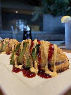 "The Monkey Brain" - Avocado, Stuffed with Spicy Tuna & Crabmeat, Topped with Spicy Eel Sauce.