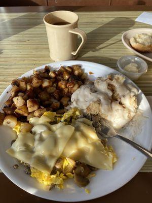 Mushroom, Swiss, egg scramble w/ fried taters, and a side of biscuits and gravy.