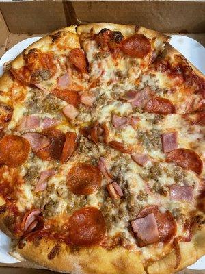 Medium -red sauce, pepperoni, ham and sausage. Liked the toppings however the end crusts were pretty tough