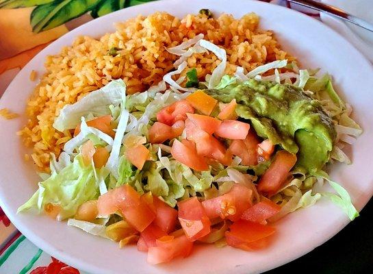 Side of rice and fajita toppings