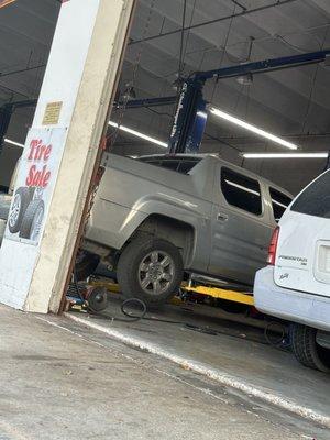 My truck in the ramp. I received complimentary shocks and low control arms labor free.