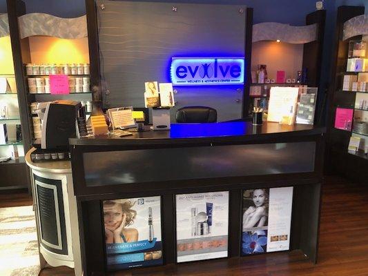 Front desk of Evolve Wellness where you will check in/out of your appointment and meet your provider for treatment.