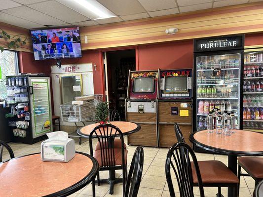 There are tables for you to enjoy your food. Live bait fridge in the corner!