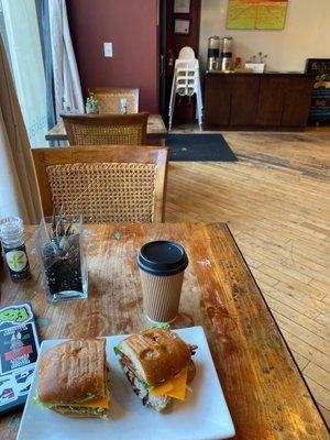 Cappuccino, oven roasted Turkey with bacon and avocado sandwich, and the entrance