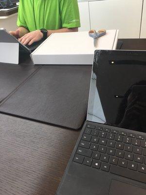 My cracked surface 4 and the replacement device in the box behind it