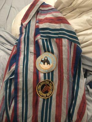 Brought in the chest of an XL to a M. Patches sewn onto the sleeve