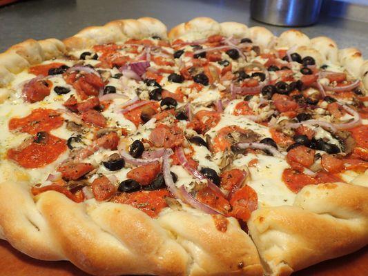 Mouth watering pizza at Blind Onion Elko!