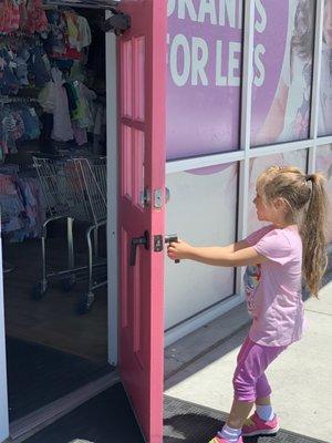 Little pink Door the kids love to use to go into the store.