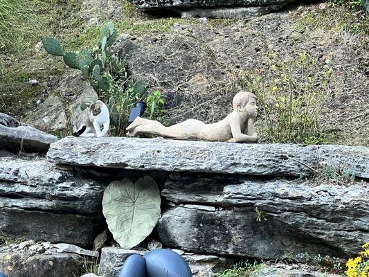 One of the grounds' statues, overlooking the pool.