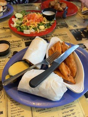 Fried chicken wrap with Nashville Hot Sauce, sweet potato fries (don't pass on the zippy sauce) and side salad