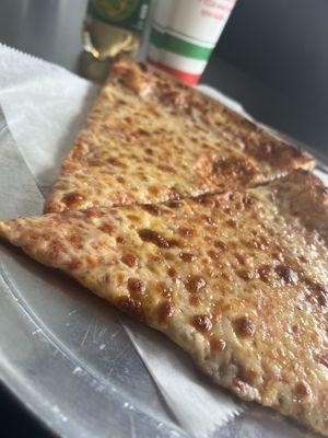 $7 Lunch special, Hot Crispy Cheesy Authentic Brooklyn Pizza! Comes with any bottle drink you like.