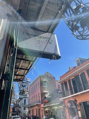 Street sign with a sun ray.