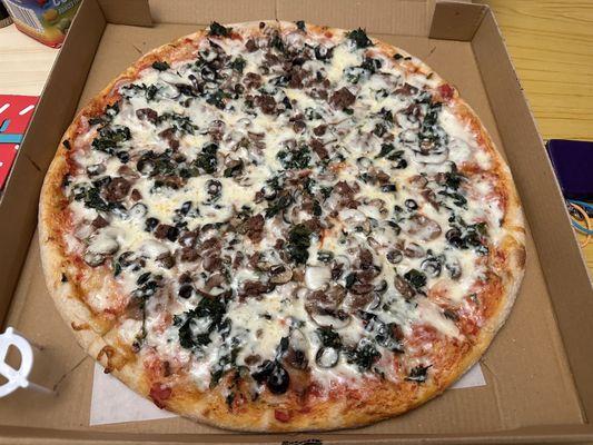 Large pie with Meatball, Sausage, Spinach, Black Olives and Mushroom and Extra Cheese.