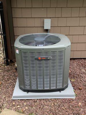 A newly installed Trane outdoor condenser unit