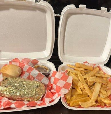 My chicken fried steak with big potato and my container full of fries missing the steak and shrimp!