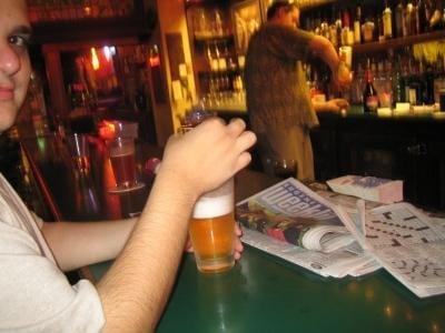 My bro Steve, drinkin' beer and doin' the crossword.