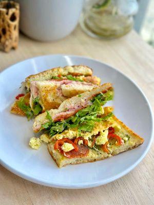 Italiano focaccia sandwich(prosciutto, salami, red peppers,etc) w/added egg