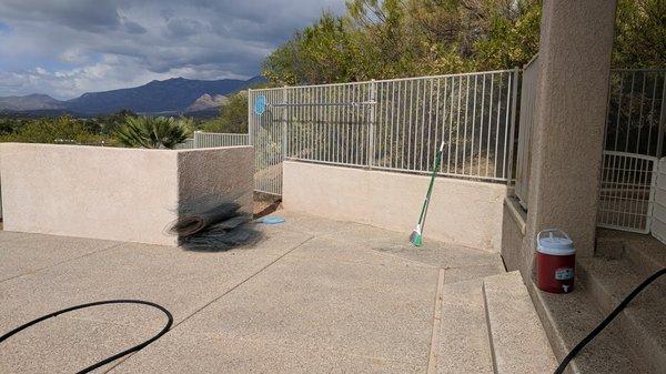 A unique pool fence/rattlesnake fence requirement at a retaining wall.