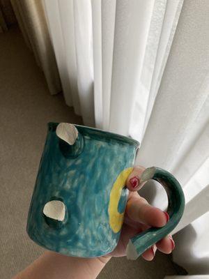 Broken mug, one of the the pieces that arrived broken.