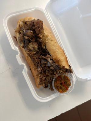 Mushroom Cheese Steak with a side of Hot Peppers.  Sun to big had to take it home.