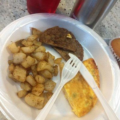 breakfast: denvered eggs, sausage, taters, juice, coffee, muffin