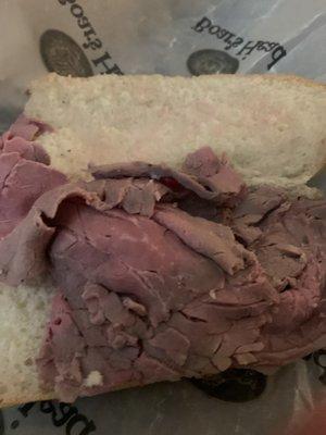 Roast beef and a roll.   No cheese no lettuce no Mayo no tomato