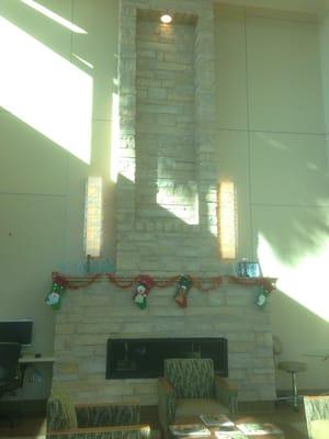 An average San Diego December sunny day at the Cancer center. Fireplace decorated to fit the holidays