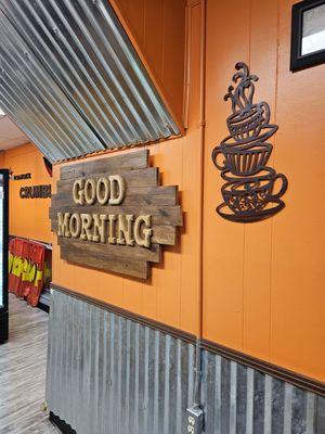 A Good Morning greeting on the wall livens the day of the customers