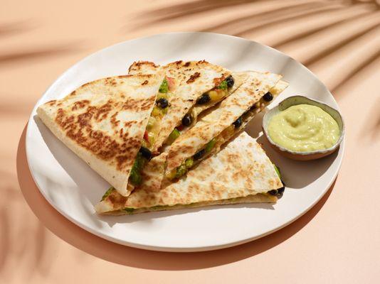 The Mango Salsa Quesadilla is a perfect meal for the summer. So light and refreshing with a pop of fruity goodness.