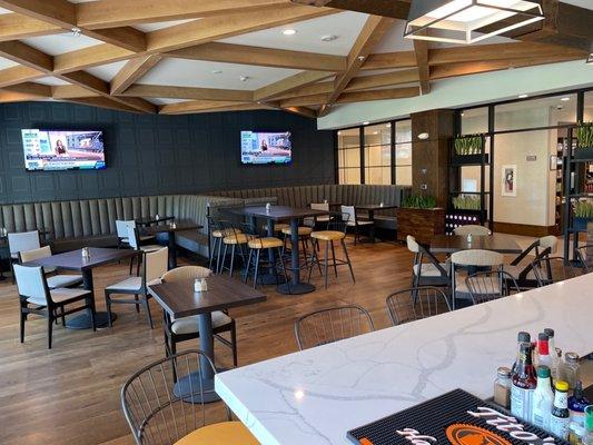 Dining area - opposite side of the bar from the main dining area. 7:45am spotlessly clean and ready for the day.