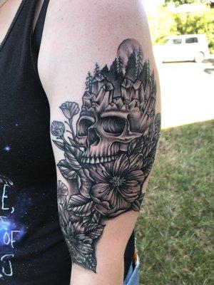 Skull and flowers by Glenn West