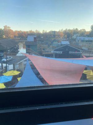 View of lakefront mini golf from our indoor seating