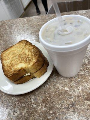 Sweet bread egg & cheese sandwich w/ a pumpkin iced coffee.