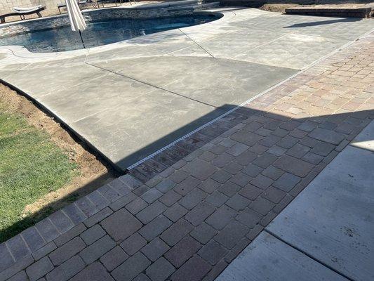 Laid brick and pavers to match our existing patio.