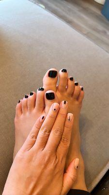 gel mani by Nhi (color: sh4 w/ black details) pedi by thuy (OPI black onyx)