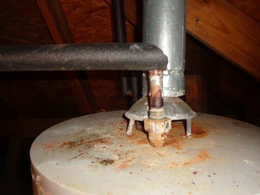 The top of the water heater is beginning to rust.