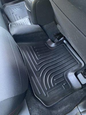 They couldn't even bother to put my floor mat back in correctly.