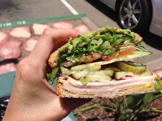 Turkey, bacon and avocado on wheat with all the fixings