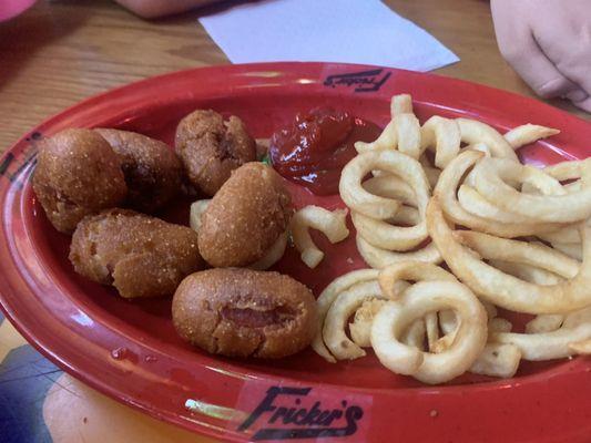 Kid's mini corndogs, curly fries (I broke dogs open to cool them off, they didn't come this way.)