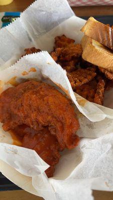 Buffalo chicken tenders with sweet potato waffle fries.