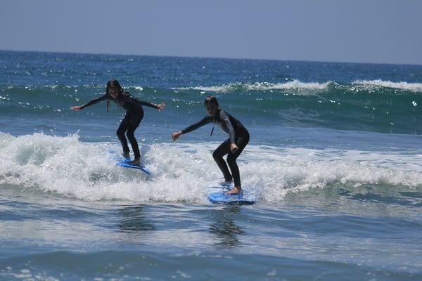 Sibling Harmony at the San Diego Surfing Academy in Carlsbad, California