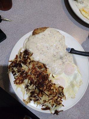 Country Fried steak, 3 eggs over easy and crispy hashbrowns too