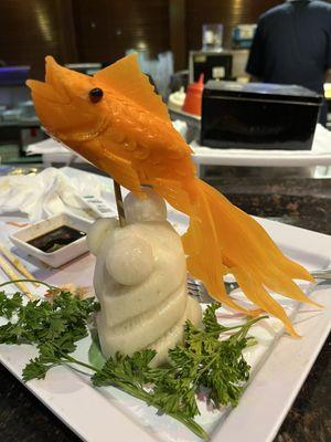 A fish made out of a carrot and radish - very cool!