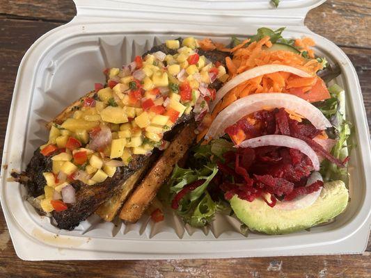 Grilled Jerk Salmon, salad, and yukka fries