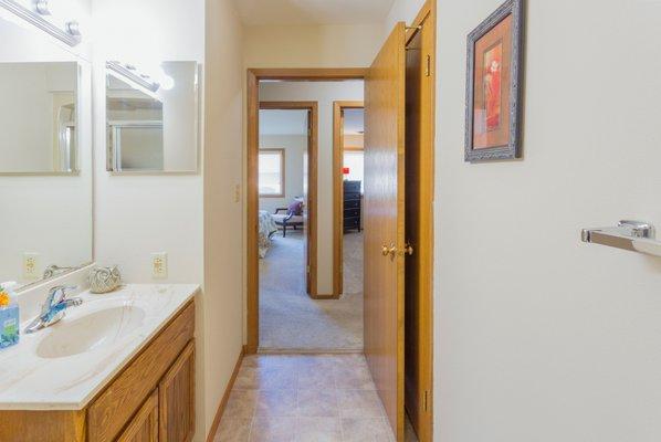 Main bathroom looking out into hallway