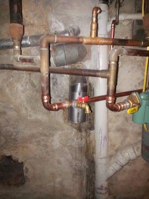 Hose bibb install for a boiler bleed line..