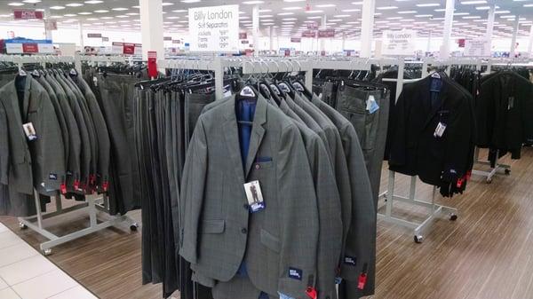 Men's suits conveniently displayed by collection.