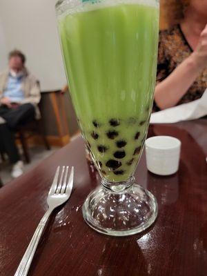 Honeydew tea which they mistakenly brought out with hard boba