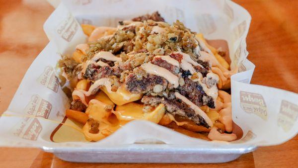 Smash Fries
topped with an onion smash patty, caramelized onion, cheese sauce and switchback sauce