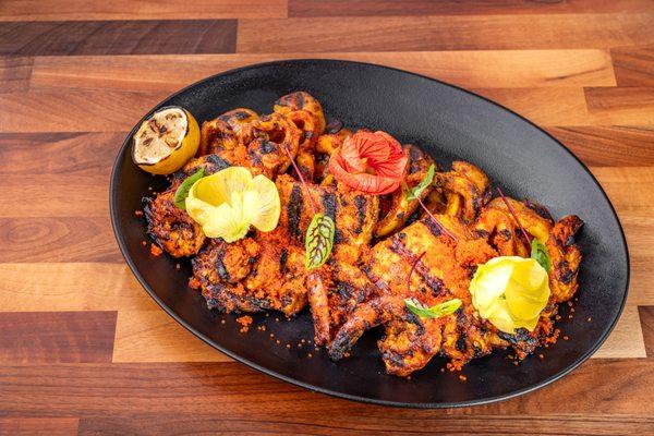 Seafood Bhaja Platter- Fish, Shrimp,& Squid (d,s)Spice blend of coastal orissa region char-grilled seafood,
roasted yukon potatoes,lemon &